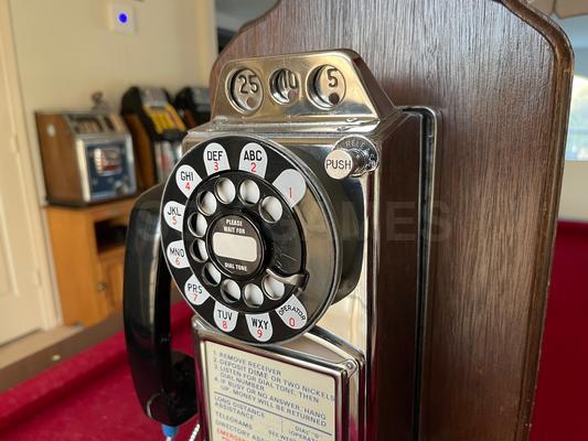 1960's Western Electric 233 Chrome 3-Slot Payphone Image