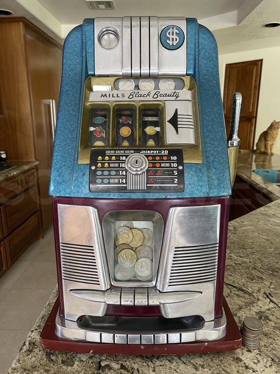 1940's Mills Black Beauty High Top Dollar Slot Machine