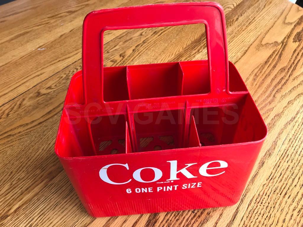 1960s hard plastic Coca-Cola six One Pint Size handled carrier