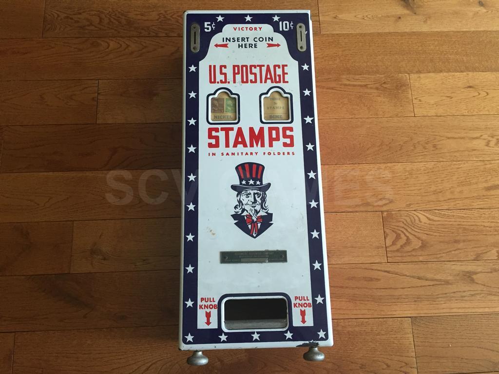 Vintage Hanging US Postage Stamp Machine with Uncle Sam